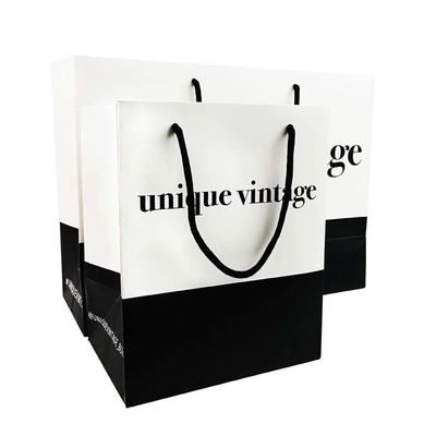 OEM Προσαρμοσμένα σχέδια Luxury Matte Gift Shopping Paper Bag με λογότυπο για ρούχα παπούτσια